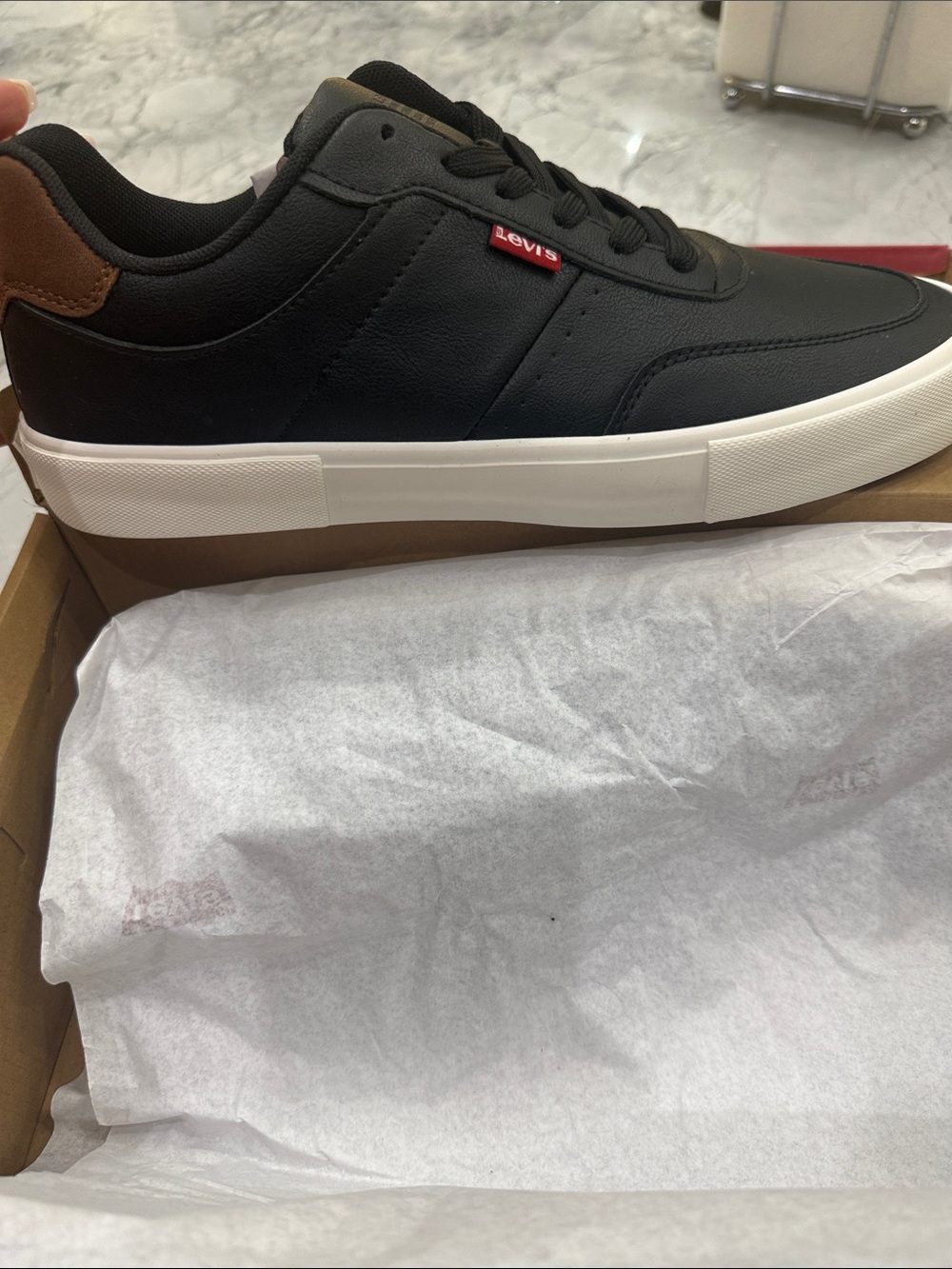Levi's Men's Black Sneakers with Brown Heel Accent and White Sole